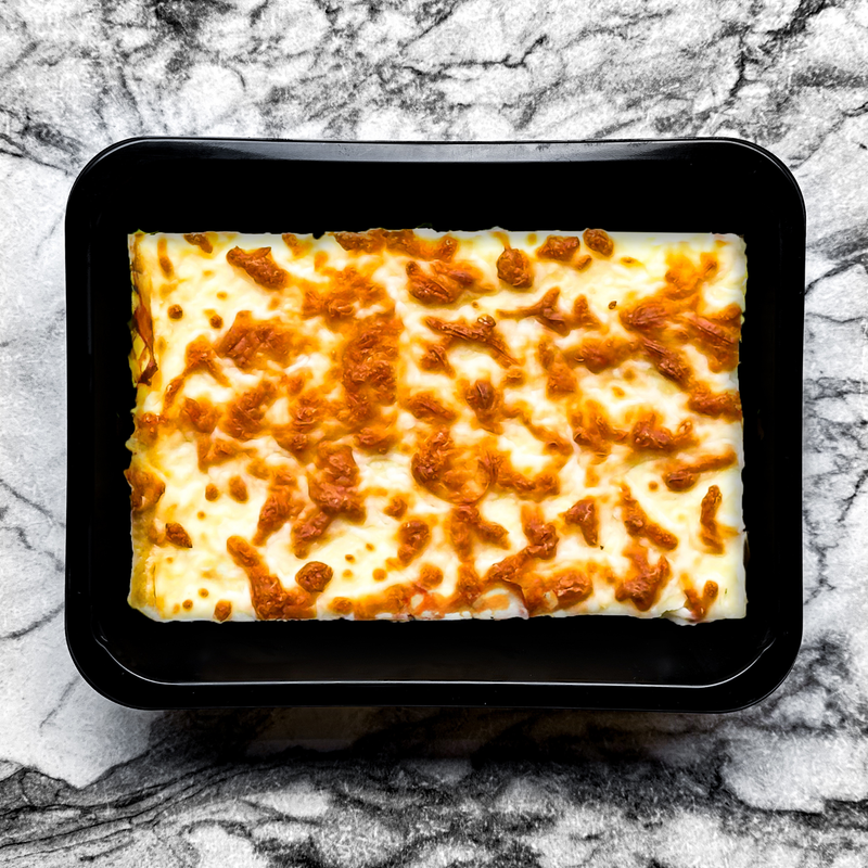 Lasagne au saumon, sauce tomate, épinards et ricotta
