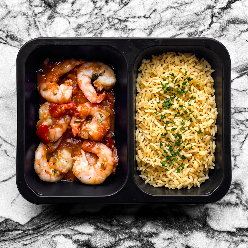 Scampis façon cajun, courgettes, poivrons et riz