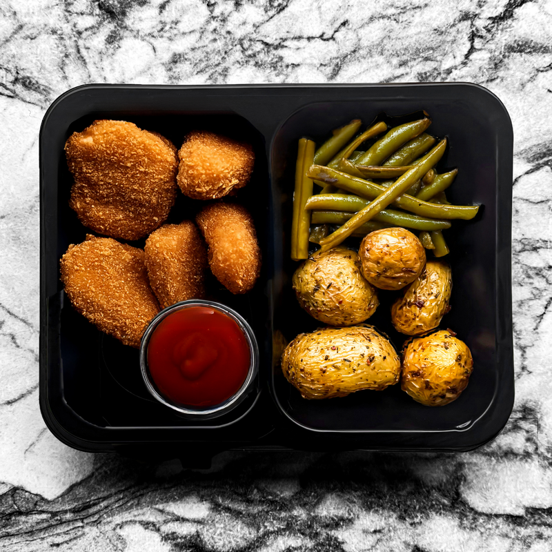 Tenders de poulet, haricots verts et grenailles rôties